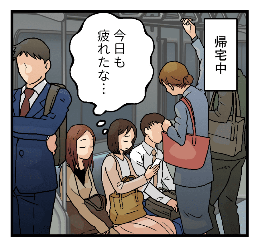帰りの電車で疲れ果てる社員。